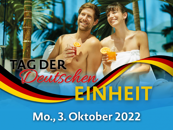 Brandenburger Tor und deutsche Flagge Tag der deutschen Einheit