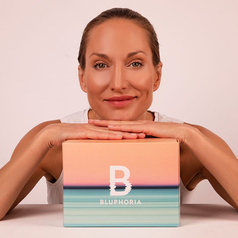 Bluphoria gift boxes in front of a spa backdrop